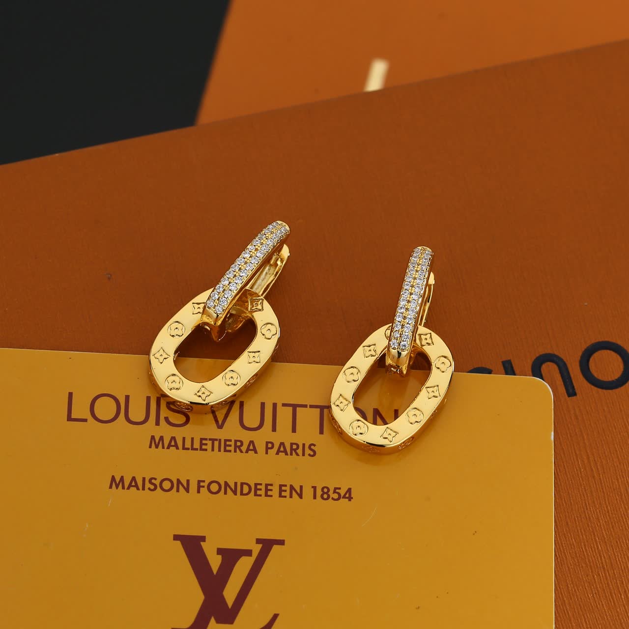 Louis Vuitton Gold Tone Earrings with Diamond Accents